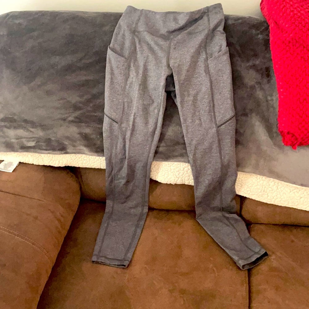 Size 2 lululemon leggings with pockets. Like new!